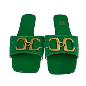 Kelly Green Slide Sandals with Gold Buckle Accents.